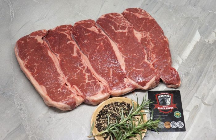 Sliced Black Angus Porterhouse Steak Grass Fed